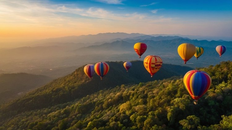 Colorful hot air balloons float above lush mountains and forests in sunrise light, showcasing clear skies and natural beauty.