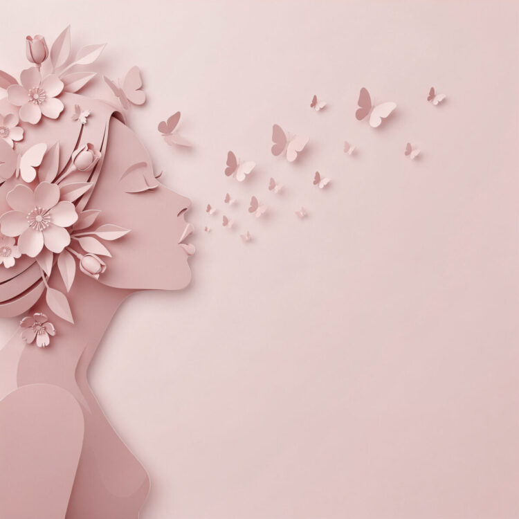 Side profile of a woman in pink paper art style adorned with flowers and butterflies flying away