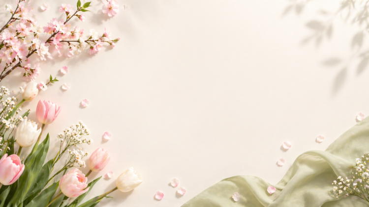 Arrangement of pink and white tulips, cherry blossoms, and delicate greenery against a soft beige background with scattered petals and light shadows